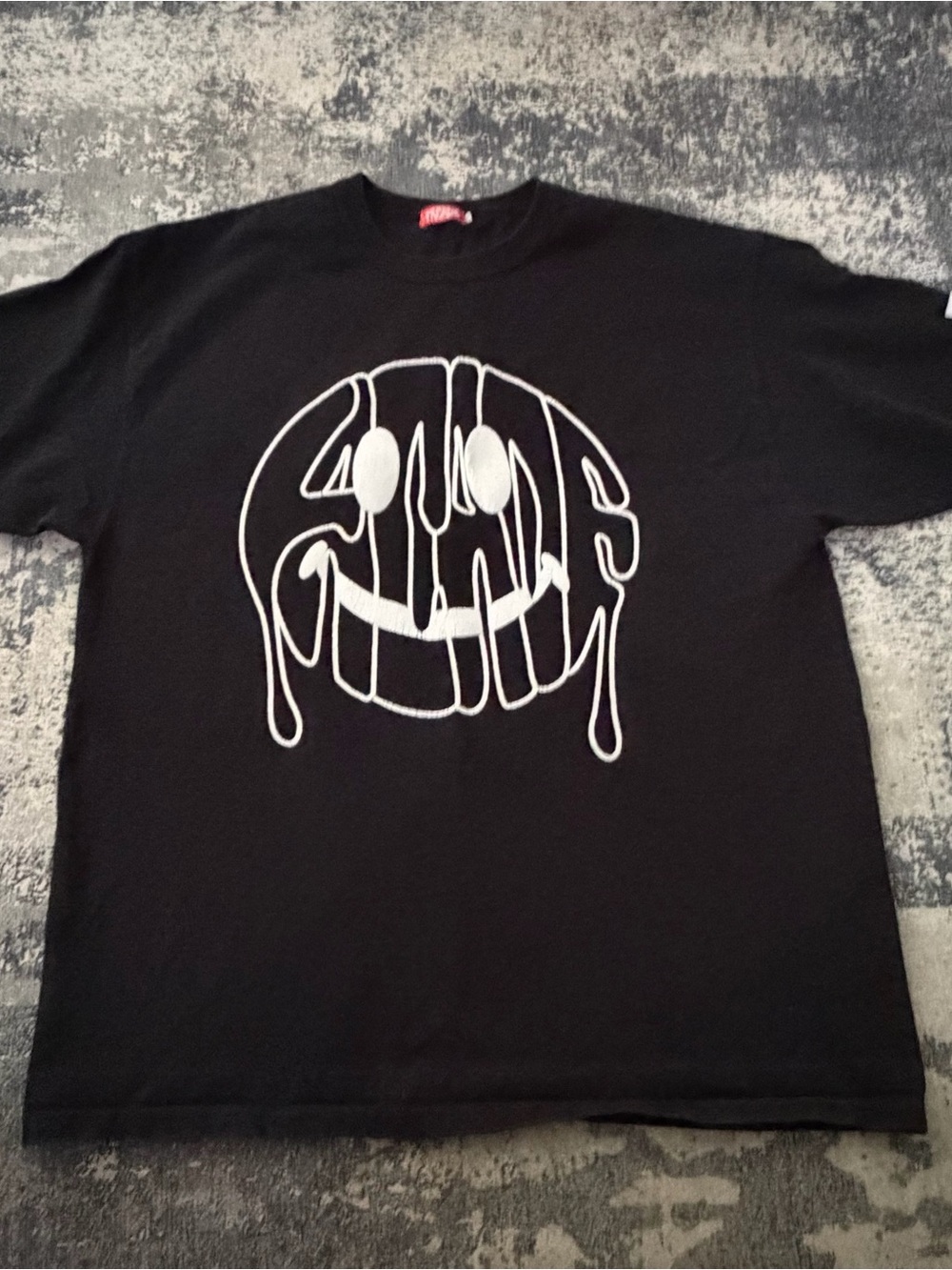Women’s Black Short Sleeve Tee with White Drip Smiley Graphic